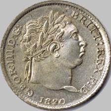 A close-up of a coin

Description automatically generated