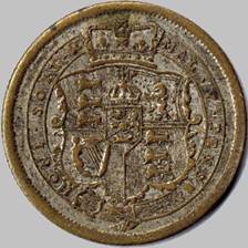 A close-up of a coin

Description automatically generated