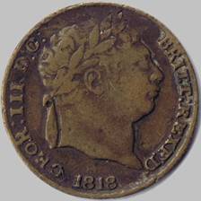 A close-up of a coin

Description automatically generated